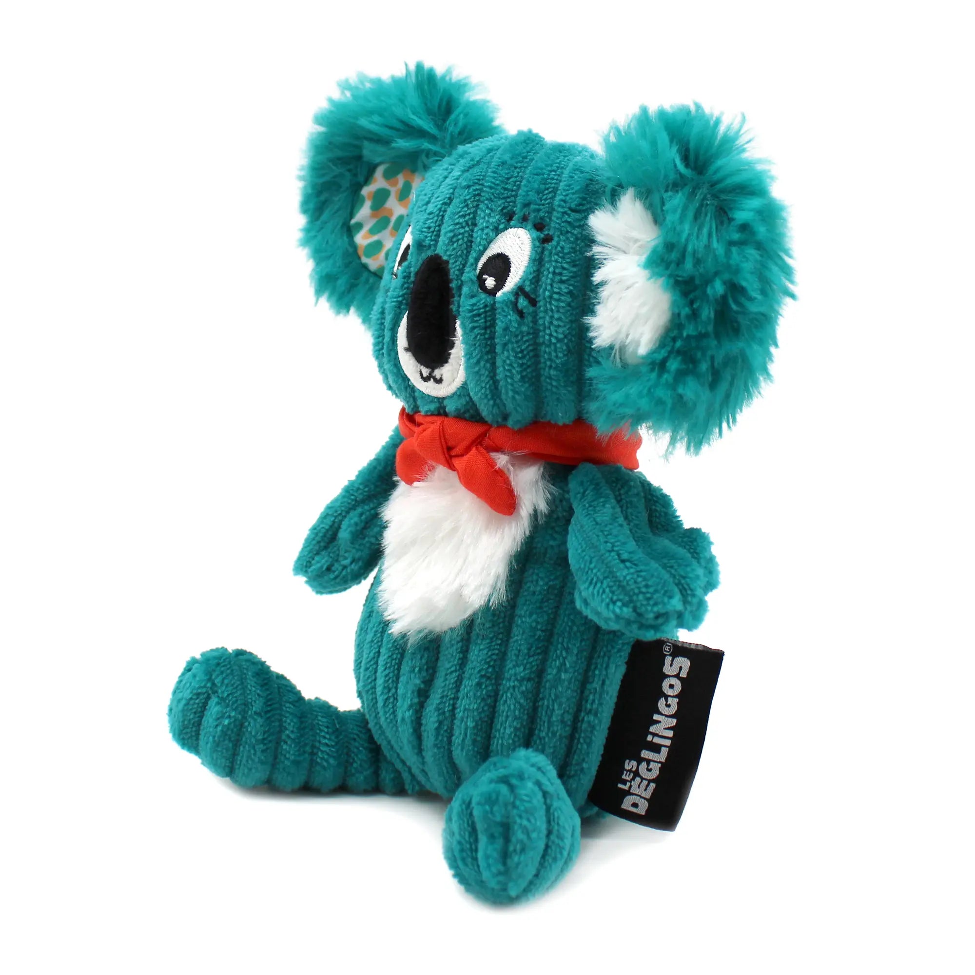 Seitliche Ansicht eines türkisen Koala Kuscheltiers aus Cordstoff mit flauschigen Ohren und roter Schleife