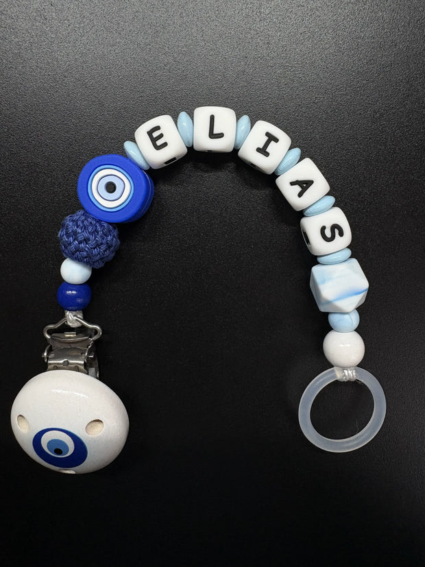 Personalisierte Schnullerkette Elias mit Bösem Auge in Blau Weiß mit Holzclip und Silikonring